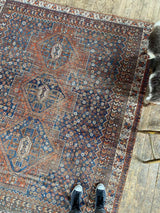 antique Persian area rug