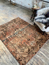 vintage Persian area rug at Petrichor Vintage Co.
