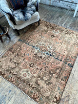 vintage Persian area rug at Petrichor Vintage Co.