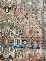 vintage Persian area rug at Petrichor Vintage Co.