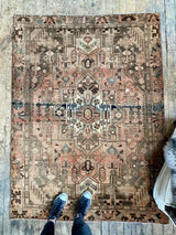 vintage Persian area rug at Petrichor Vintage Co.