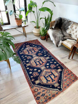 vintage Persian area rug at Petrichor Vintage Co.
