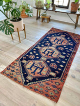 vintage Persian area rug at Petrichor Vintage Co.