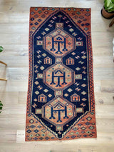 vintage Persian area rug at Petrichor Vintage Co.