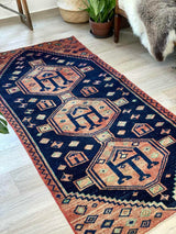 vintage Persian area rug at Petrichor Vintage Co.