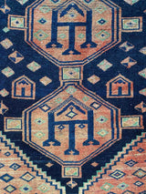vintage Persian area rug at Petrichor Vintage Co.