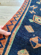 vintage Persian area rug at Petrichor Vintage Co.