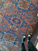 antique Caucasian area rug at Petrichor Vintage Co.