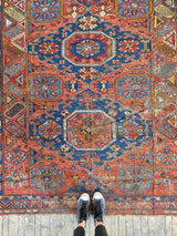 antique Caucasian area rug at Petrichor Vintage Co.