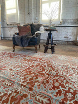 antique Persian area rug at Petrichor Vintage Co.
