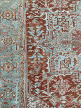 antique Persian area rug at Petrichor Vintage Co.