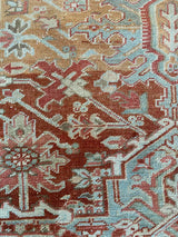 antique Persian area rug at Petrichor Vintage Co.