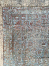 vintage Persian area rug at Petrichor Vintage Co.