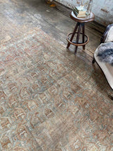 vintage Persian area rug at Petrichor Vintage Co.