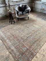 vintage Persian area rug at Petrichor Vintage Co.