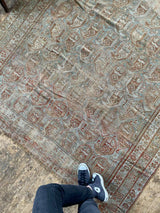 vintage Persian area rug at Petrichor Vintage Co.