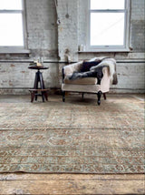 vintage Persian area rug at Petrichor Vintage Co.