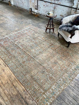 vintage Persian area rug at Petrichor Vintage Co.