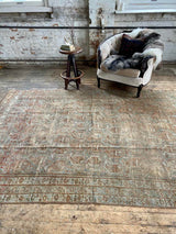 vintage Persian area rug at Petrichor Vintage Co.