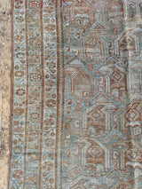 vintage Persian area rug at Petrichor Vintage Co.