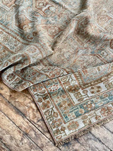 vintage Persian area rug at Petrichor Vintage Co.