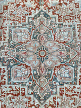 antique Persian area rug at Petrichor Vintage Co.