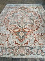 antique Persian area rug at Petrichor Vintage Co.