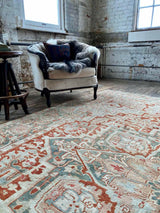 antique Persian area rug at Petrichor Vintage Co.