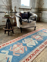 antique Persian runner rug at Petrichor Vintage Co.