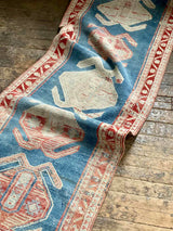 antique Persian runner rug at Petrichor Vintage Co.