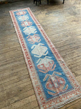 antique Persian runner rug at Petrichor Vintage Co.
