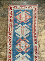 antique Persian runner rug at Petrichor Vintage Co.