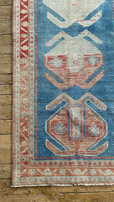antique Persian runner rug at Petrichor Vintage Co.
