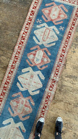 antique Persian runner rug at Petrichor Vintage Co.