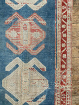 antique Persian runner rug at Petrichor Vintage Co.