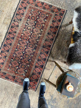 antique Perian accent rug