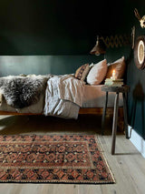 antique Perian accent rug