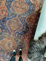 Antique Persian area rug