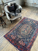 antique Persian area rug