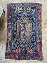 antique Persian area rug