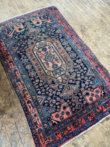 antique Persian area rug