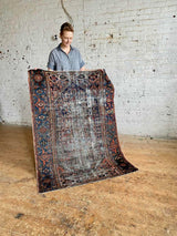 Antique Persian area rug