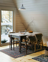 antique Persian area rug at Petrichor Vintage Co.