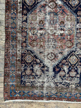 antique Persian area rug