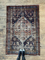 antique Persian area rug