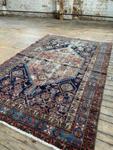 antique Persian area rug