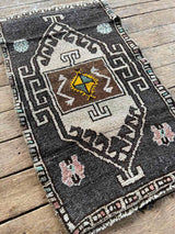 Vintage Turkish accent rug