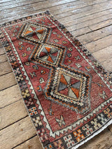 Vintage Turkish accent rug