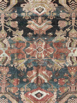 Hand-knotted vintage Persian rug at Woven Kin Home