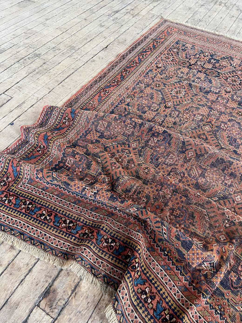 antique vintage area rug sustainable home decor at Woven Kin Home